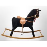 A Mamas and Papas rocking horse,