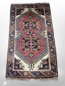 A Caucasian rug 139 cm x 76 cm