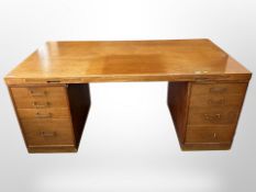 A mid century Danish twin-pedestal desk,