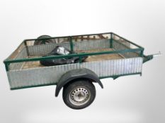 A single axle metal trailer with wooden floor,