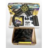 A boxed Scalextric Le Mans 24 racing set and a further box of track etc