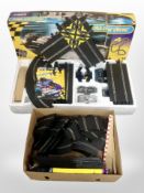 A boxed Scalextric Le Mans 24 racing set and a further box of track etc
