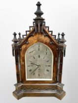 An impressive Victorian Gothic Revival carved oak bracket clock,