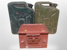 Two jerry cans together with metal storage box