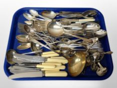 A tray of stainless steel and EPNS flatware