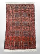 An Afghan Bokhara rug 104 cm x 62 cm