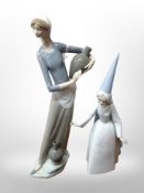 A Lladro figure of a lady carrying an urn together with one other