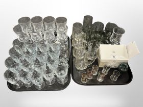Two trays of Scandinavian drinking glasses including Holmegaard etc