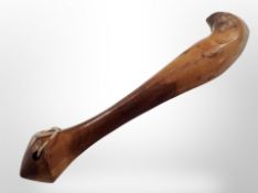 An unusual polished wooden hand club / priest,