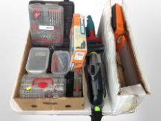 A box of Black and Decker drill, performance drill bits, volt meter, Bosch hedge trimmer,
