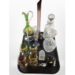 A group of crystal decanters, paperweight, gilt glass ewer and four goblets,