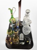 A group of crystal decanters, paperweight, gilt glass ewer and four goblets,