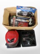 A Nitro racing helmet together with a boxed 250PSI compressor, foot pump, tyre pressure gauge,