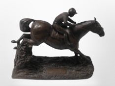 A Heredities figure of a jockey on Red Rum,