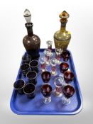 Two antique silvered decanters and three sets of sherry glasses