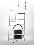 Two aluminium step ladders and a further two-tread step