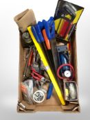 A box of tools, hand saws, foot pump, drill bits, socket set,