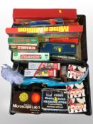 Two boxes of vintage and later board games, toys, battery operated cards,