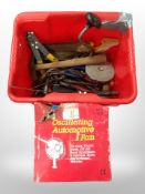 A box of assorted vintage hand tools,