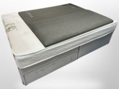 A 4'6 storage divan with Comfort Deluxe mattress and headboard