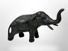 A contemporary bronze figure of an elephant,