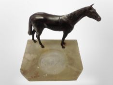 A spelter and onyx horse ashtray,