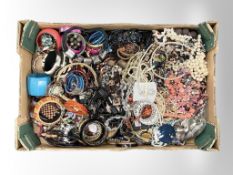 A large box of costume jewellery : bangles,