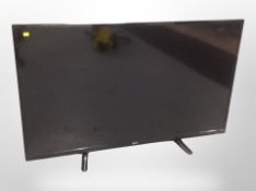 A Seiki 54 inch LCD TV with remote and lead