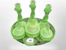 A group of Art Deco green dressing table glass ware