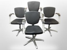 Four chrome and black vinyl rise and fall swivel chairs