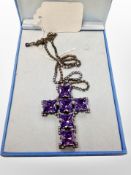 A 1980's Butler and Wilson Crystal crucifix pendant on similar chain CONDITION REPORT: