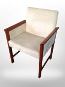 A 20th century Danish teak armchair in cream suede upholstery