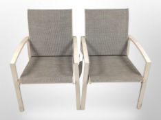 A pair of garden armchairs