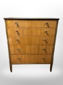 A 1970's teak five drawer chest,