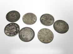 Seven Chinese white metal coins