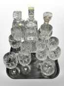 A Bohemian crystal decanter and three others,
