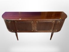 A late 20th century Danish mahogany bow-fronted sideboard,