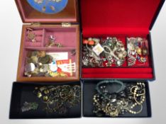 Several jewellery boxes containing costume jewellery, silver viking longship brooch,