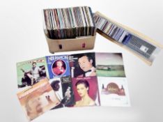 A cd rack of CD's and a further box of LP's and 45's including Rod Stewart,