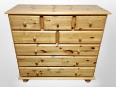 A pine eight drawer chest,