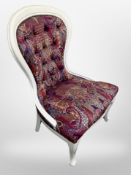 A Victorian style nursing chair in paisley pattern fabric