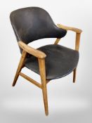 A 20th century Danish teak A-frame armchair in black vinyl
