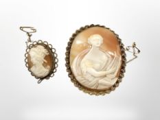 Two antique yellow gold filigree mounted cameo brooches, the largest 55 mm x 60 mm.