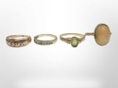Four yellow gold rings, three set with gemstones. CONDITION REPORT: 10.7g.