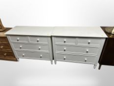 A pair of contemporary four drawer chests,