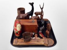 A group of carved hardwood elephant ornaments, antelope ornaments, further giraffe figure,