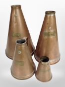 A graduated set of four Victorian copper measuring jugs, half pint, quart, 2.