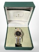 A Lady's Gucci watch in original box CONDITION REPORT: Currently running.