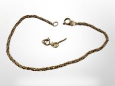 A 9ct yellow gold bracelet, length 19 cm, further chain fragment.