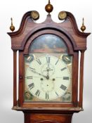 A 19th century oak 30 hour longcase clock with pendulum and weight,